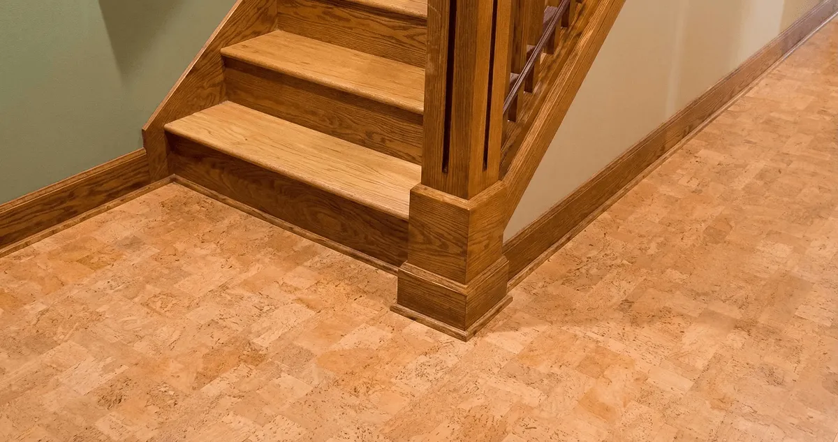 End of a staircase with cork flooring in Jacksonville, FL